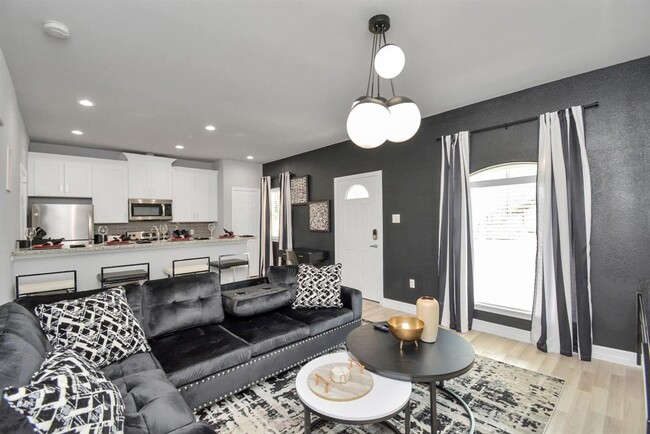 Living Room Modern apartment living room open to kitchen, Modern living room design, Houston Apartments